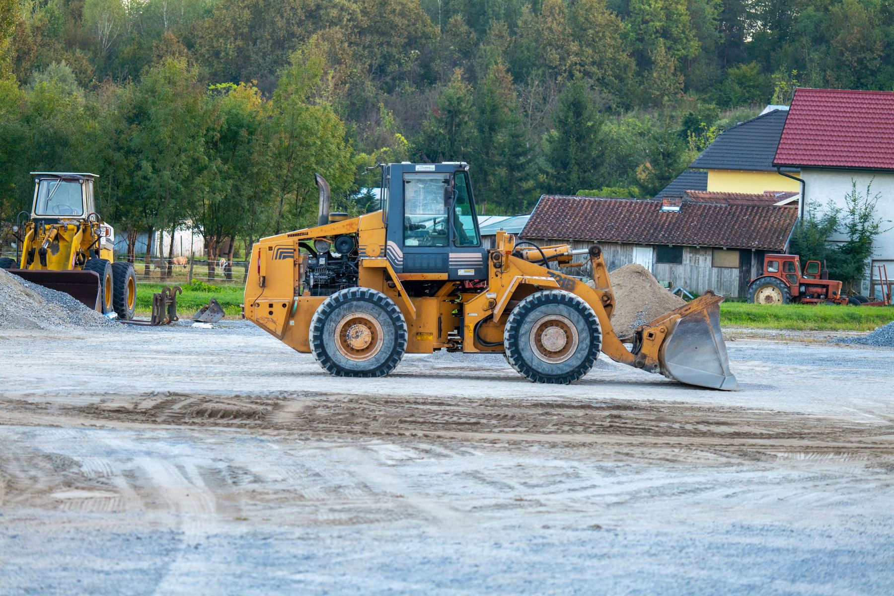 Caterpillar wheel loader working a stockpile